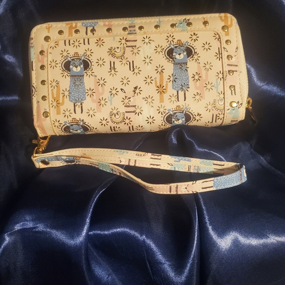 Under One Sky Handbags - LLAMA WRISTLET LOTS OF COMPARTMENTS NWOT
